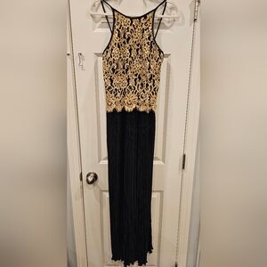 140 - Elegant Black and Gold Lace Dress